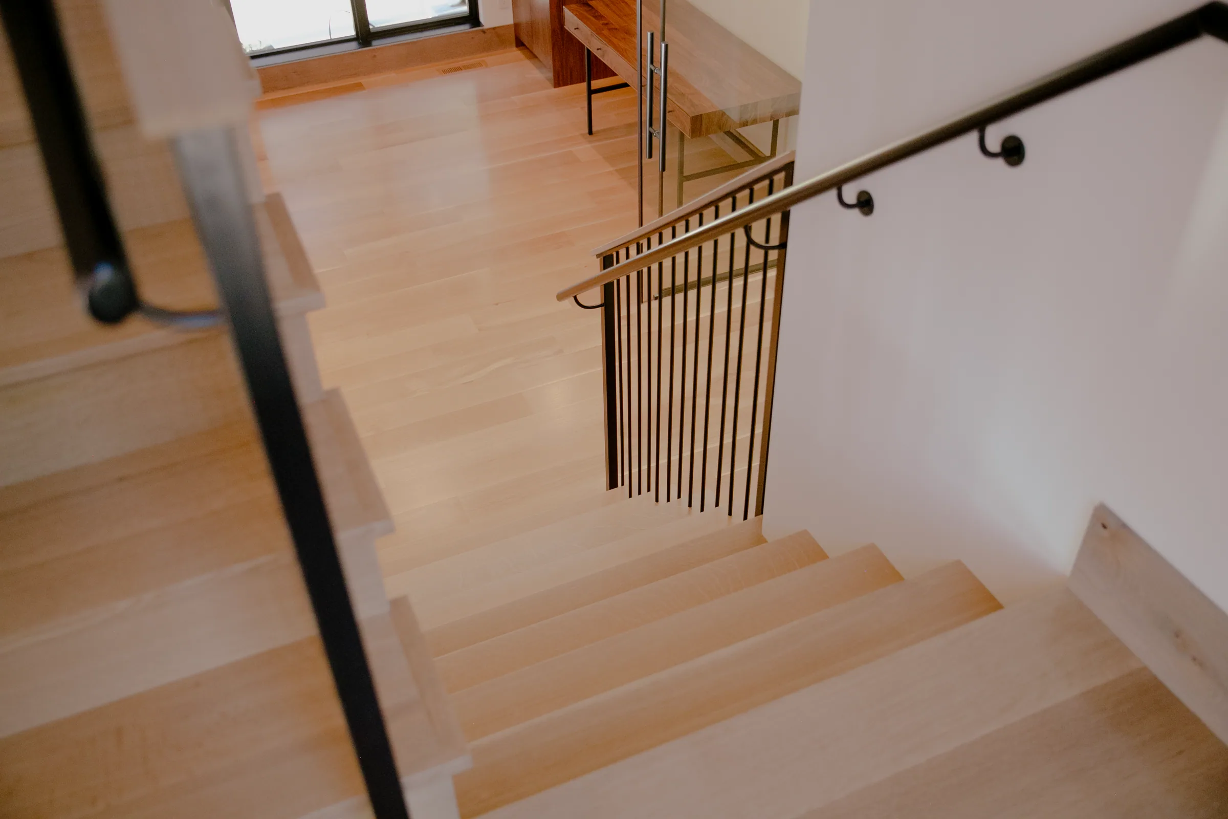 High-end hardwood stair treads installed by Winnwood Flooring